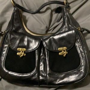 Antonio Melani leather purse. Lots of great zipper pockets.